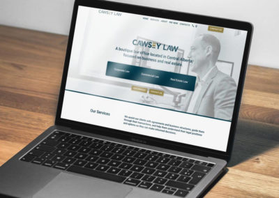 web design of Cawsey Law's website on a laptop, homepage