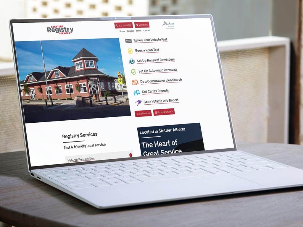 Stettler Registries custom web design mockup on a laptop