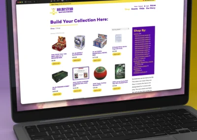 Holmestead Sports Cards & Collectibles shop page on a laptop