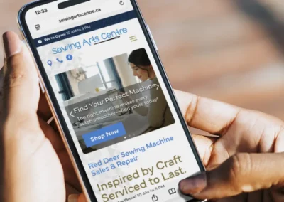 Sewing Arts Centre Red Deer Website on a mobile phone