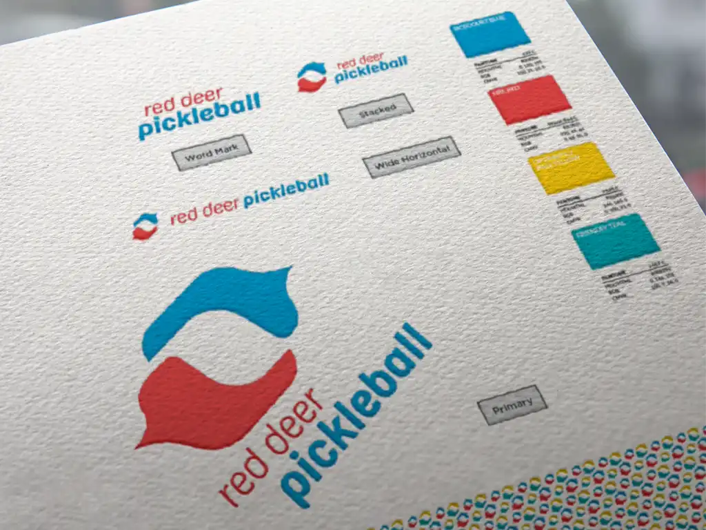 Red Deer pickleball brand - logo design mockups on a sheet of paper
